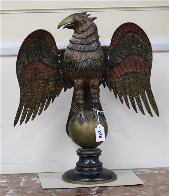 A cold painted metal figure of an eagle height 50cm